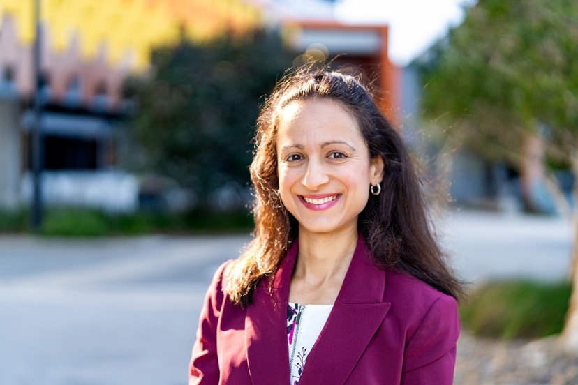 A staff member outside GC Campus