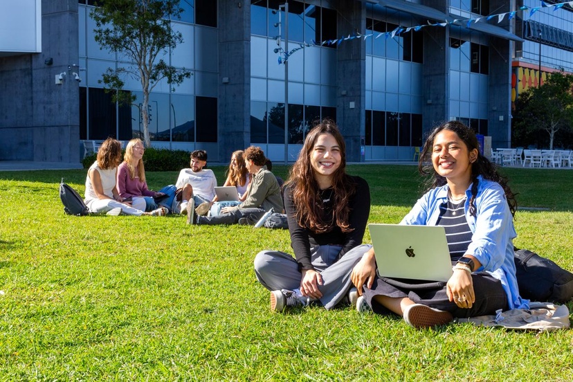 Students sitting on the grass
