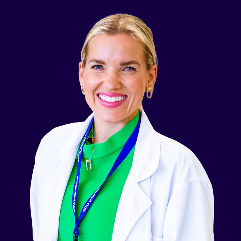 Martina S smiling at the camera with edited colour background