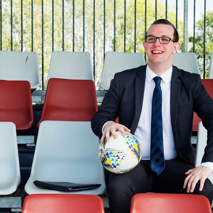 Man in football stands