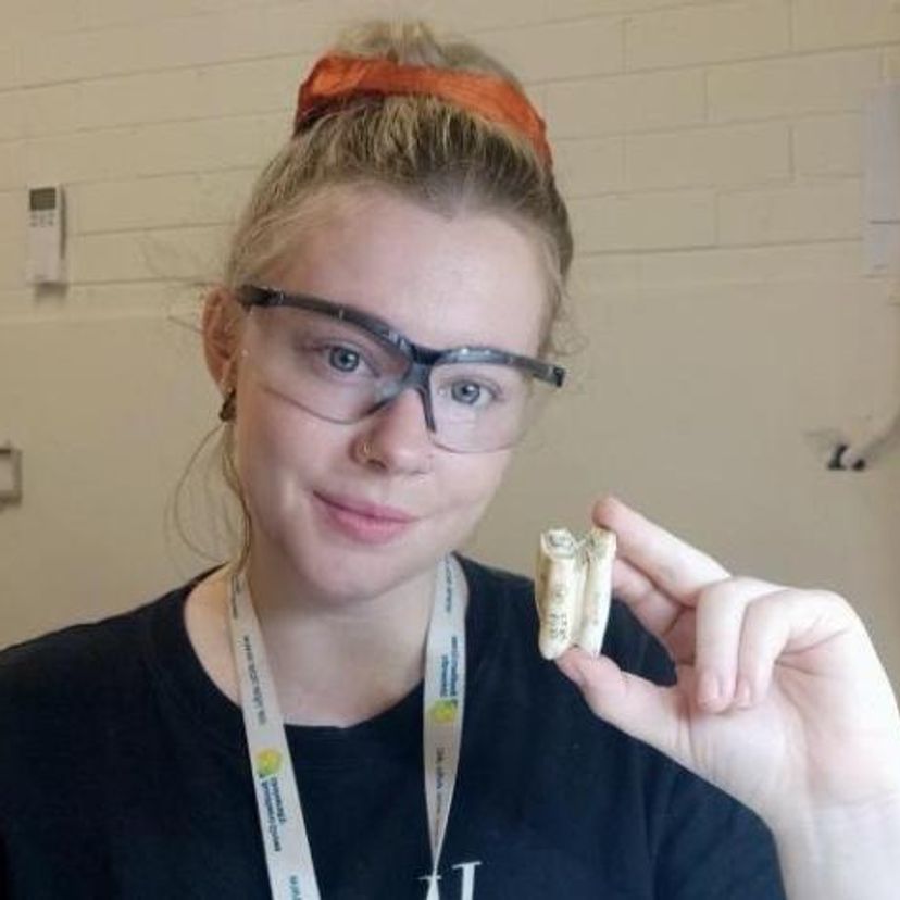 Marian Bailey with bone fossil