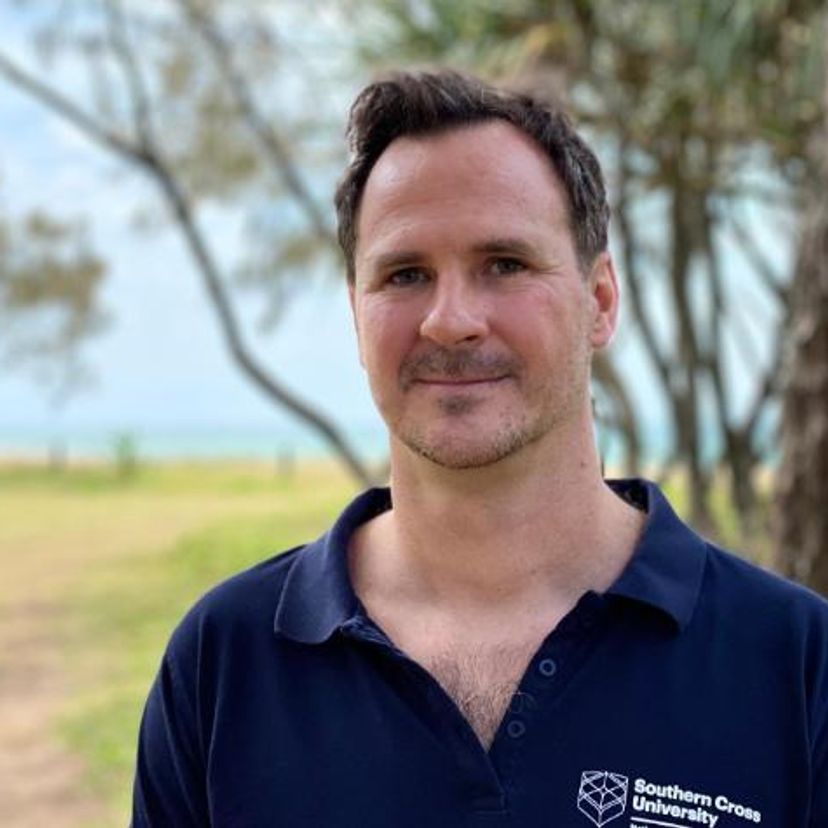 Man standing facing camera