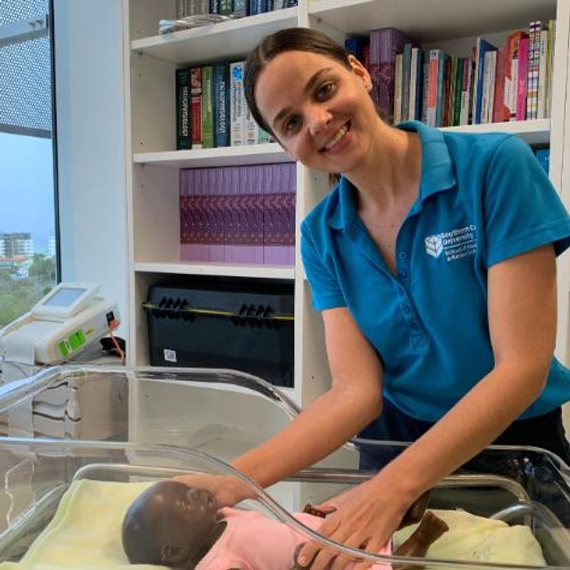 Student nurse with baby manequin