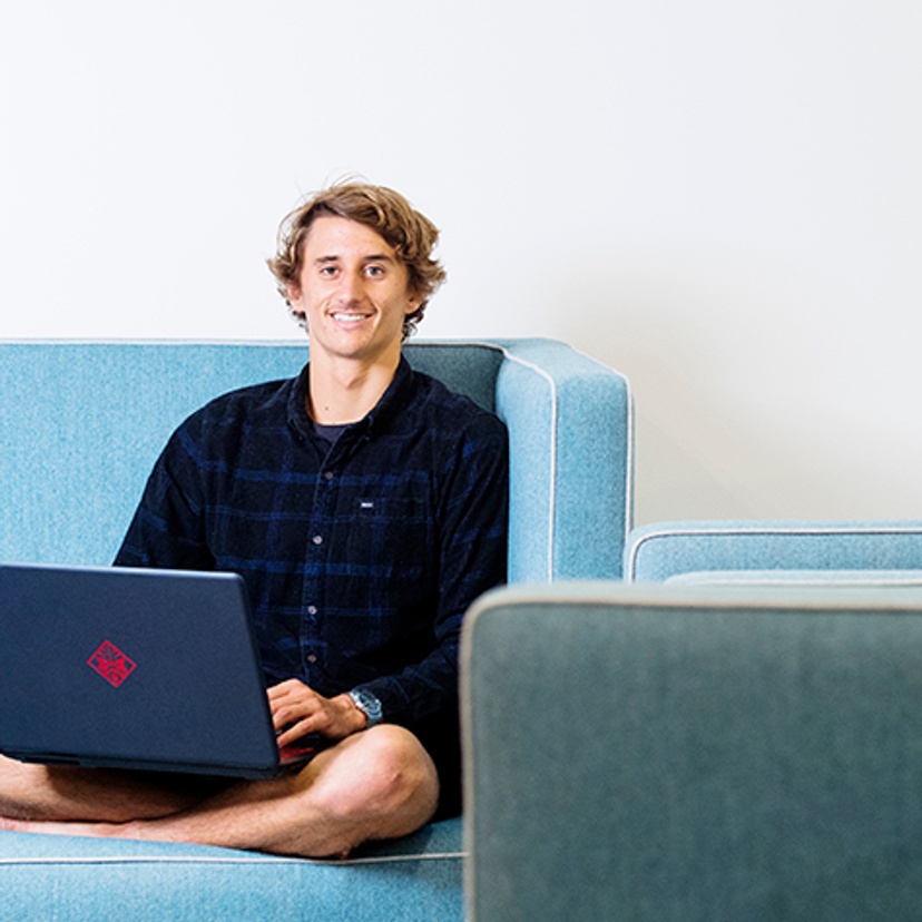 Josh Clouston studying