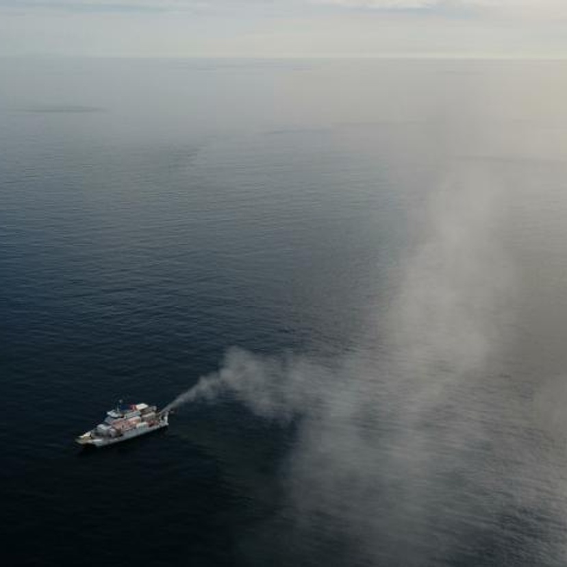 Plume of seawater droplets from sprayer rises into the sky