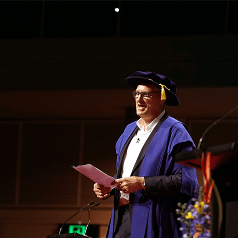 Justin Harrison in academic dress