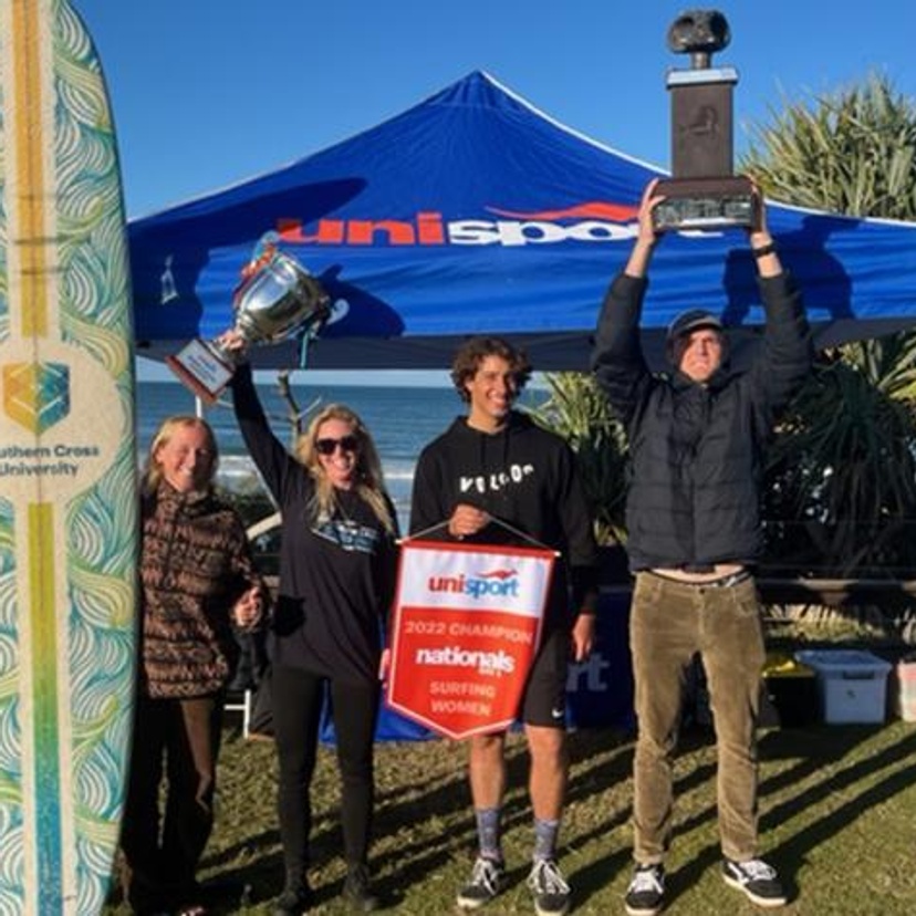 Surfing Team SCU winners with trophy
