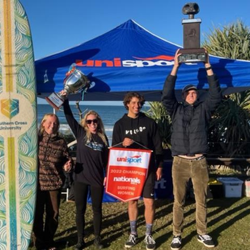 Surfing Team SCU winners with trophy