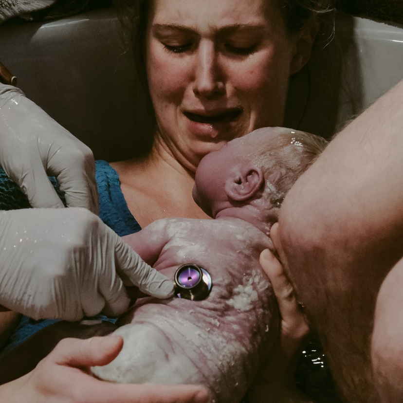 Newborn baby with mother