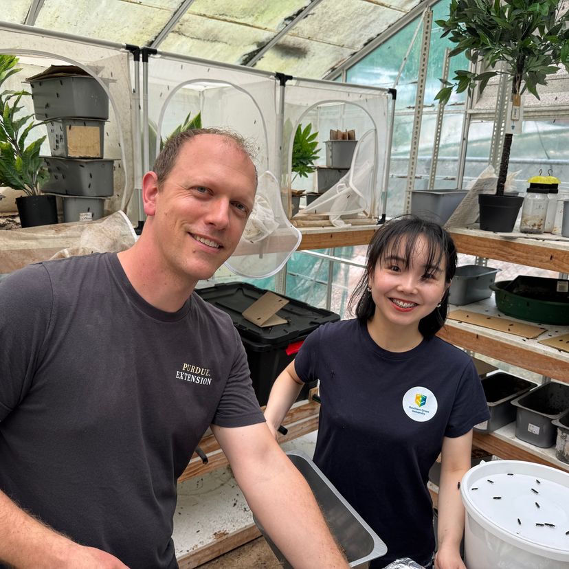 A man and a woman in an open laboratory setting