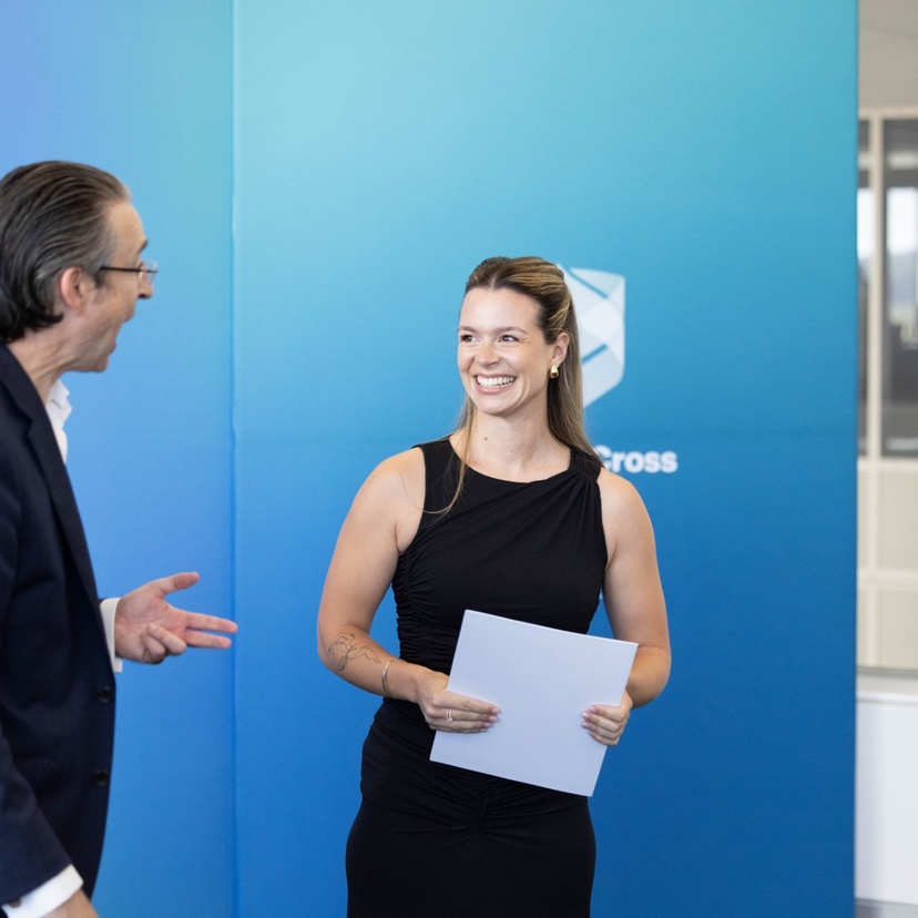 Dr Carla Velario accepting award for research excellence