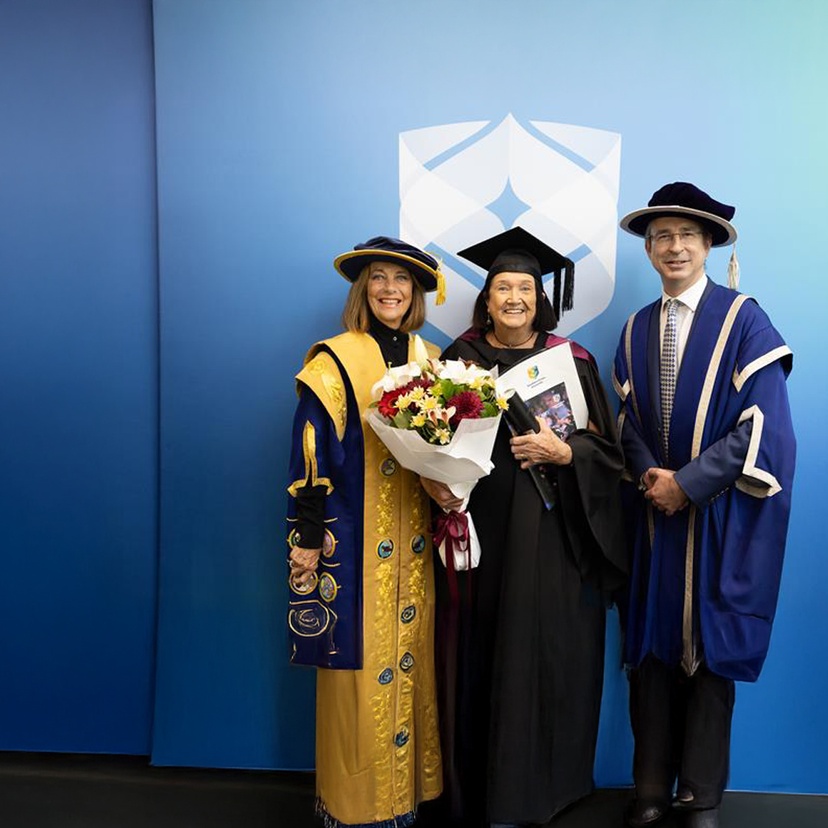 Graduation ceremony - Law Graduate Maureen with Chancellor and Vice Chancellor