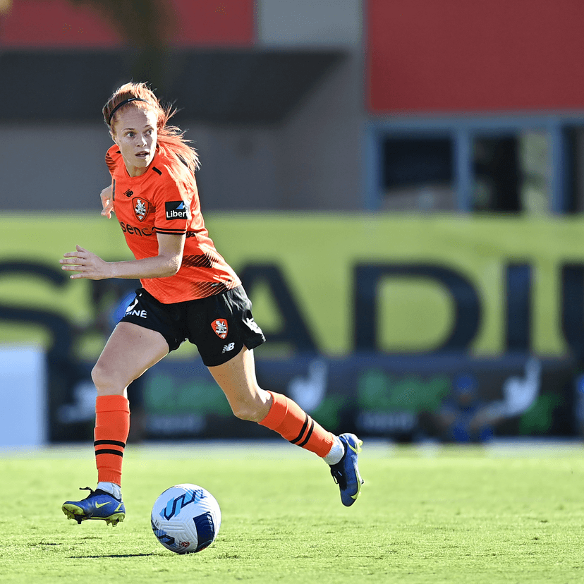 Woman playing soccer