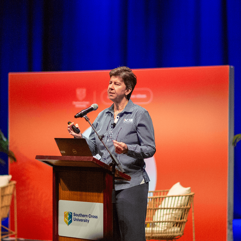 Academic speaking at lectern