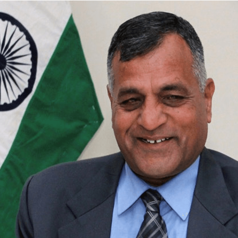 Man in suit with Indian flag