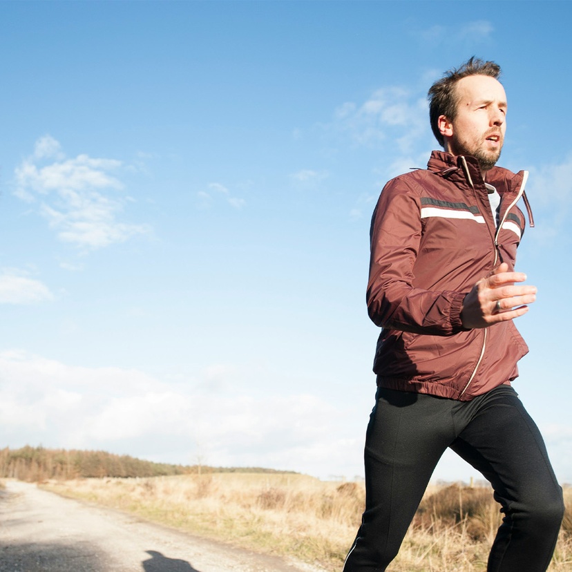 Man running on a country road