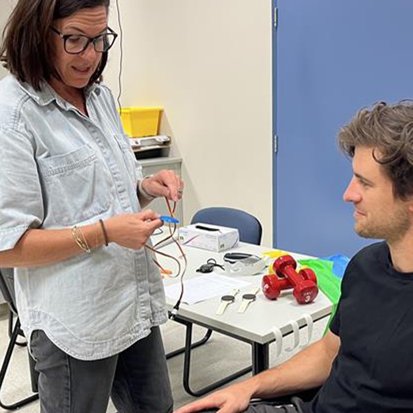 Woman talking with man in wheelchair