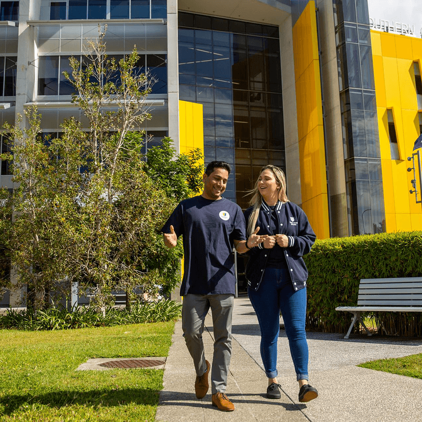 two students walking outside Gold Coast campus