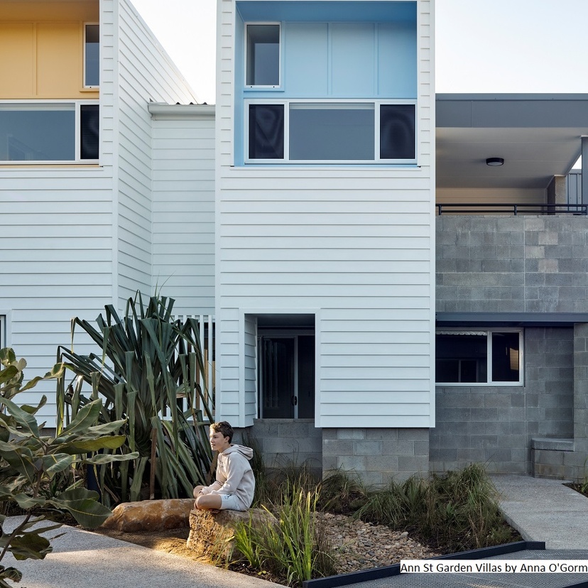 An architectural render of terrace houses