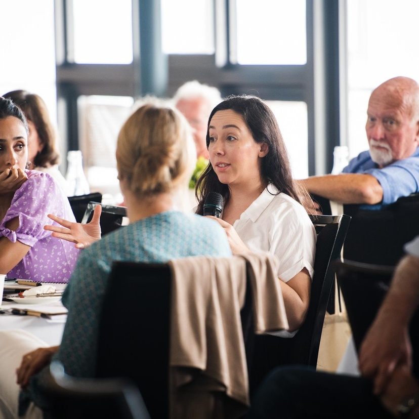 attendees sitting at event