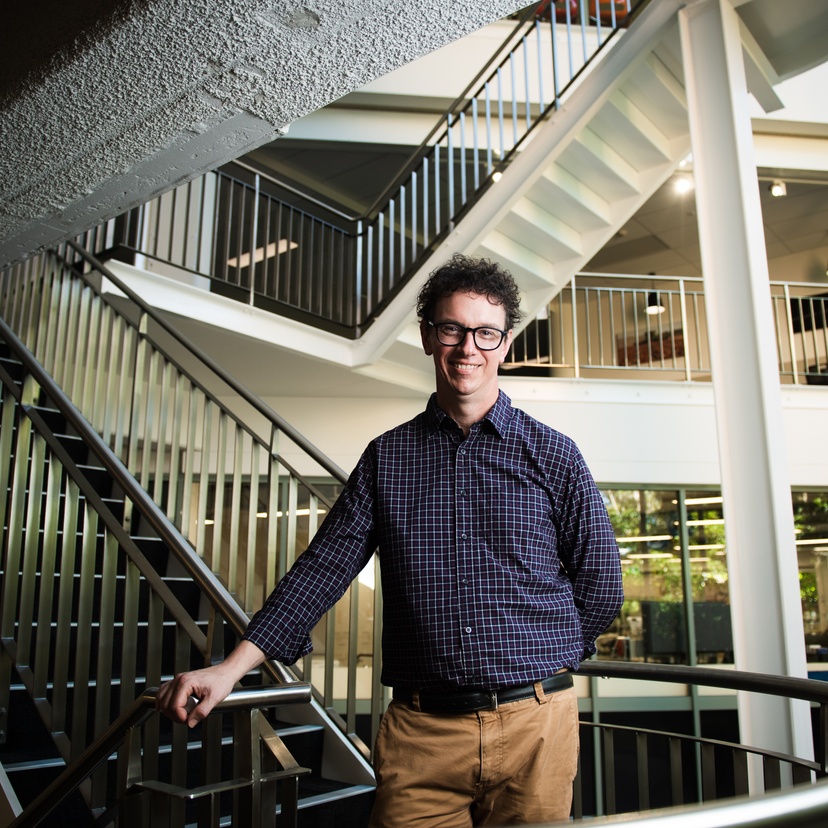 Academic standing on stairs