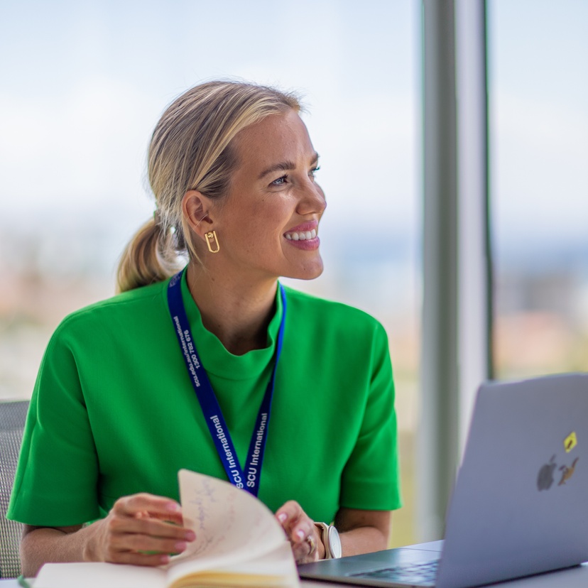 Martina Svoboda studying at laptop