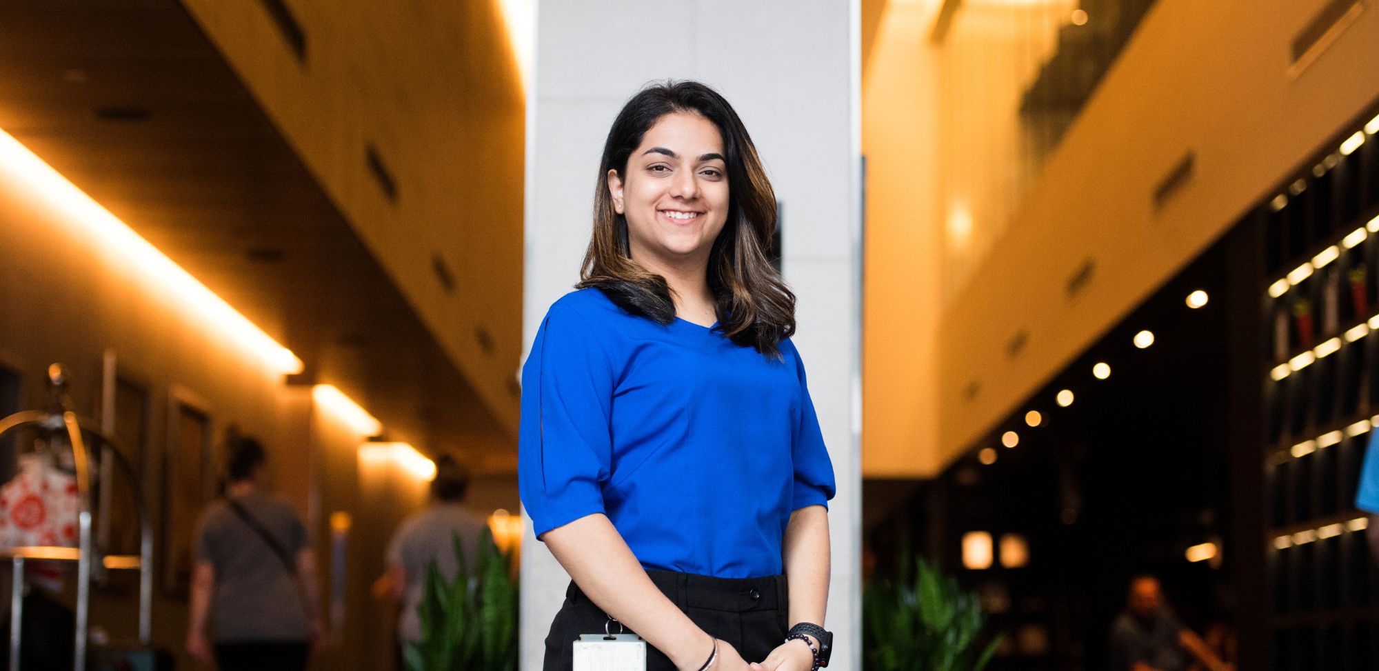 Women in blue shirt smiling